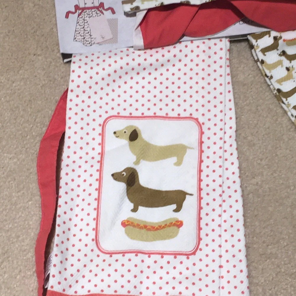 Dachshund themed apron and dish towel set .